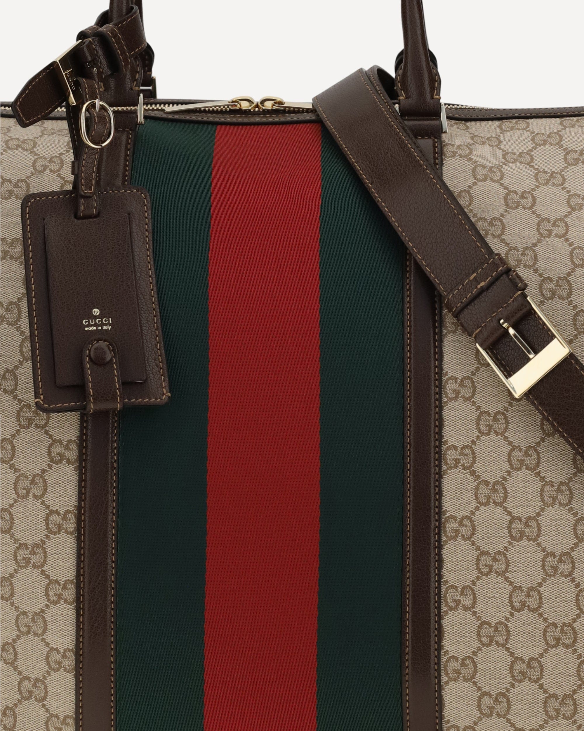 حقيبة سفر Gucci GG دفل بخط Web Stripe