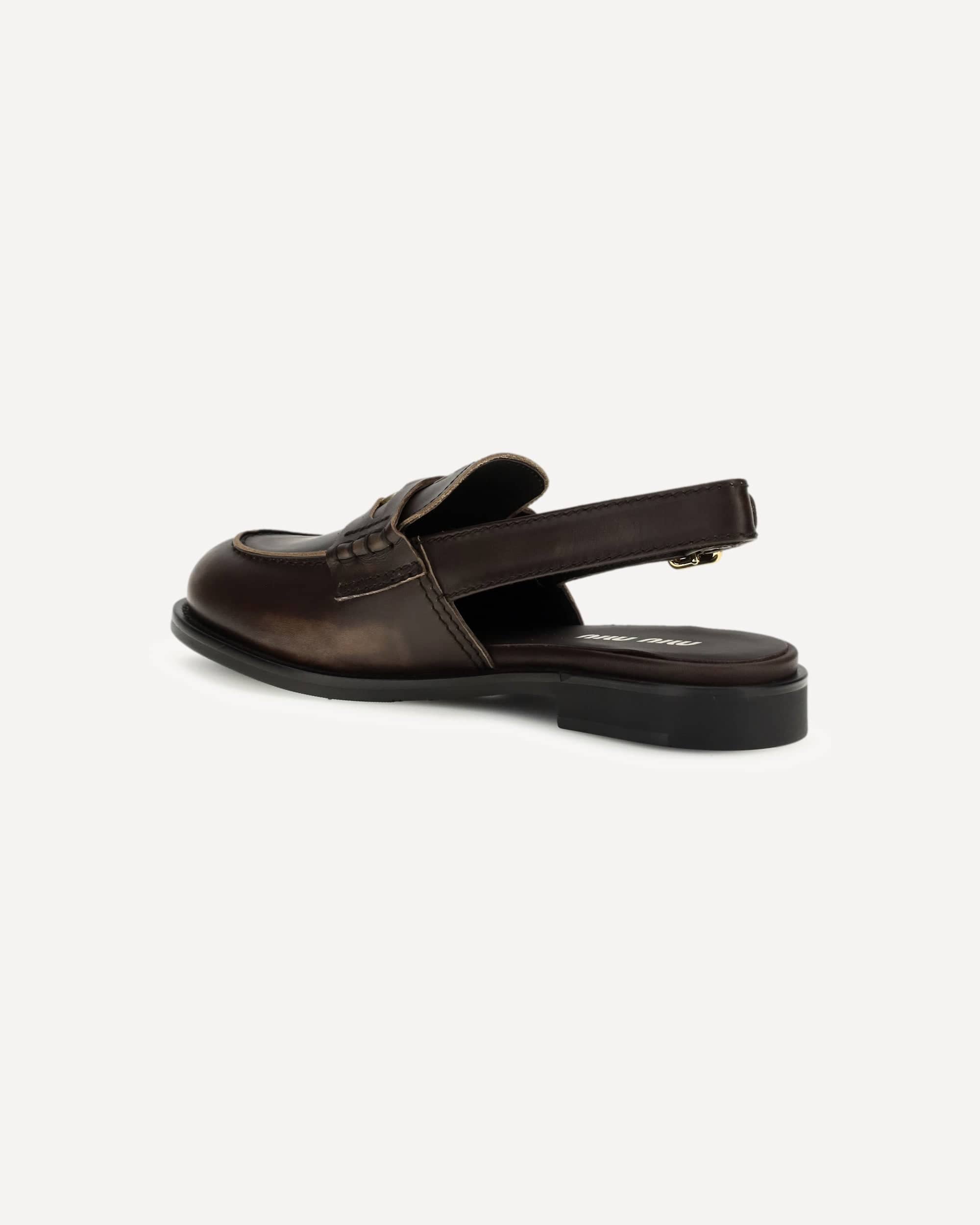 Miu Miu Buckled Leather Loafers