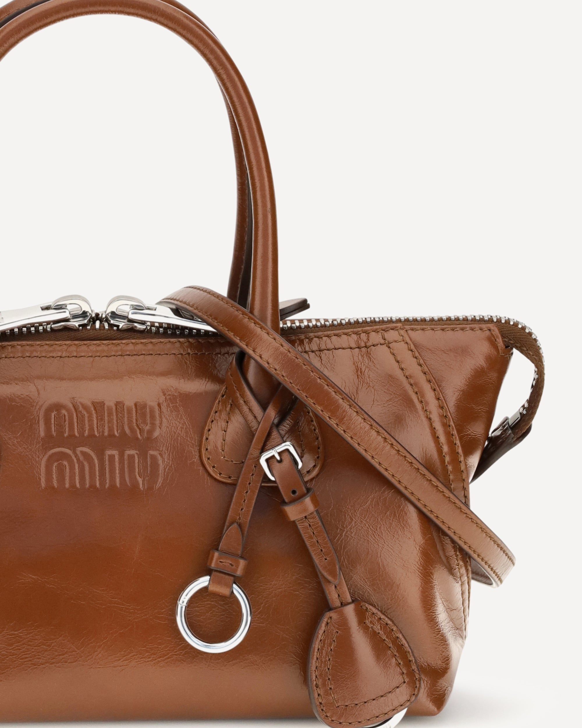 Bolso de mano de cuero brillante Miu Miu