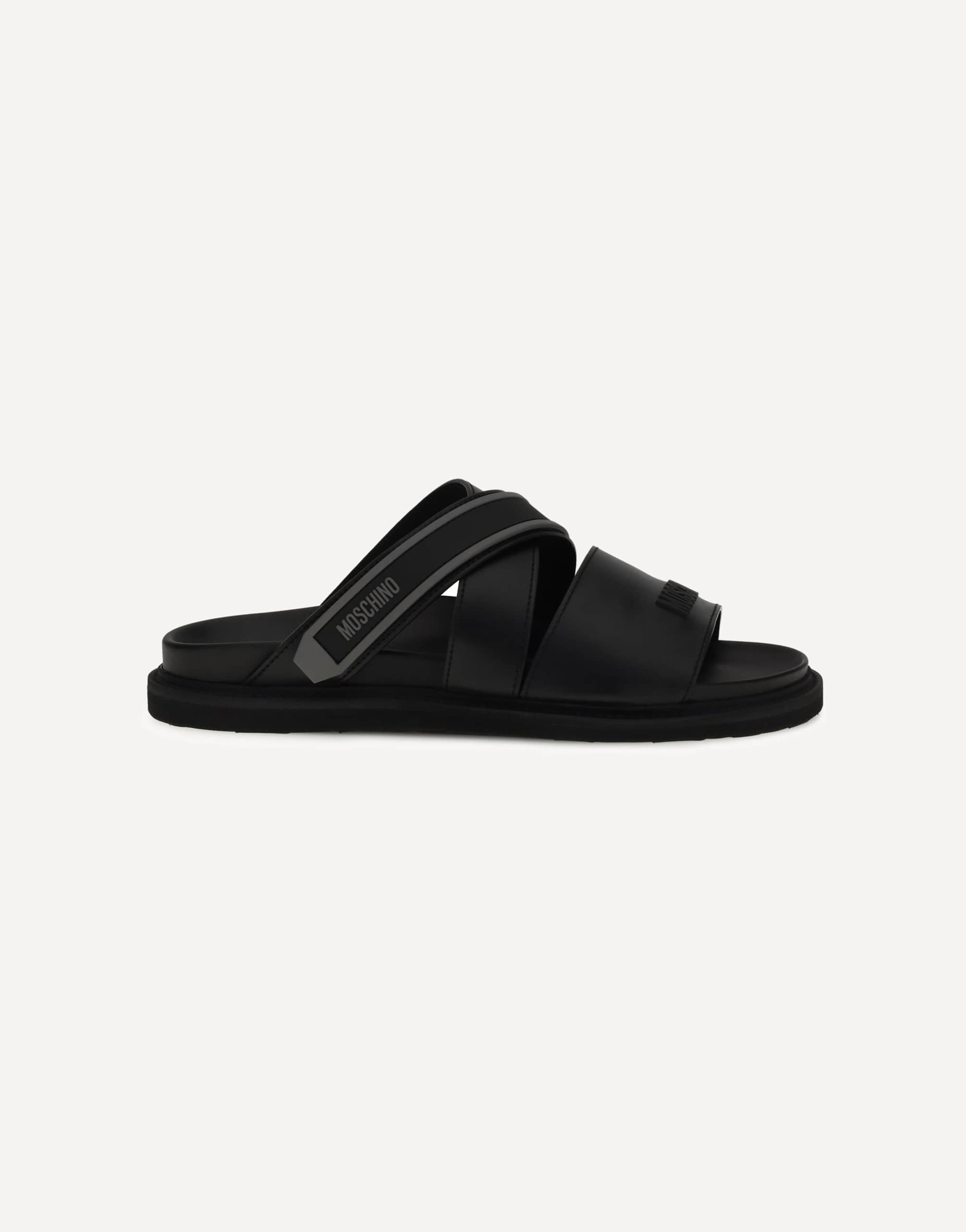 Moschino Flat Leather Sandals With Logo Weave