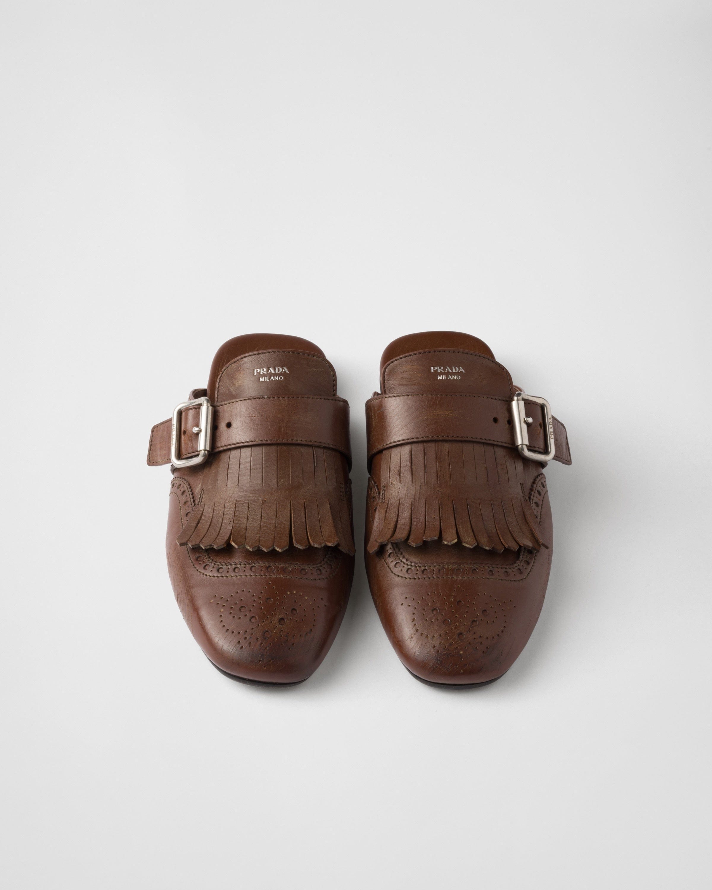 Prada Shuffle Fringed Leather Mules