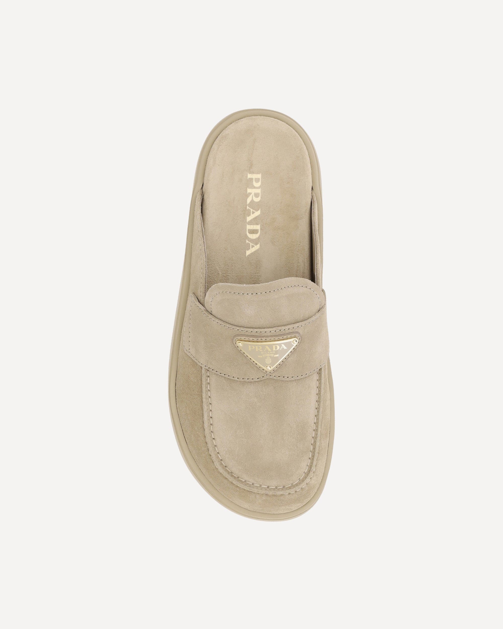 Prada Suede Mules With Triangular Plaque
