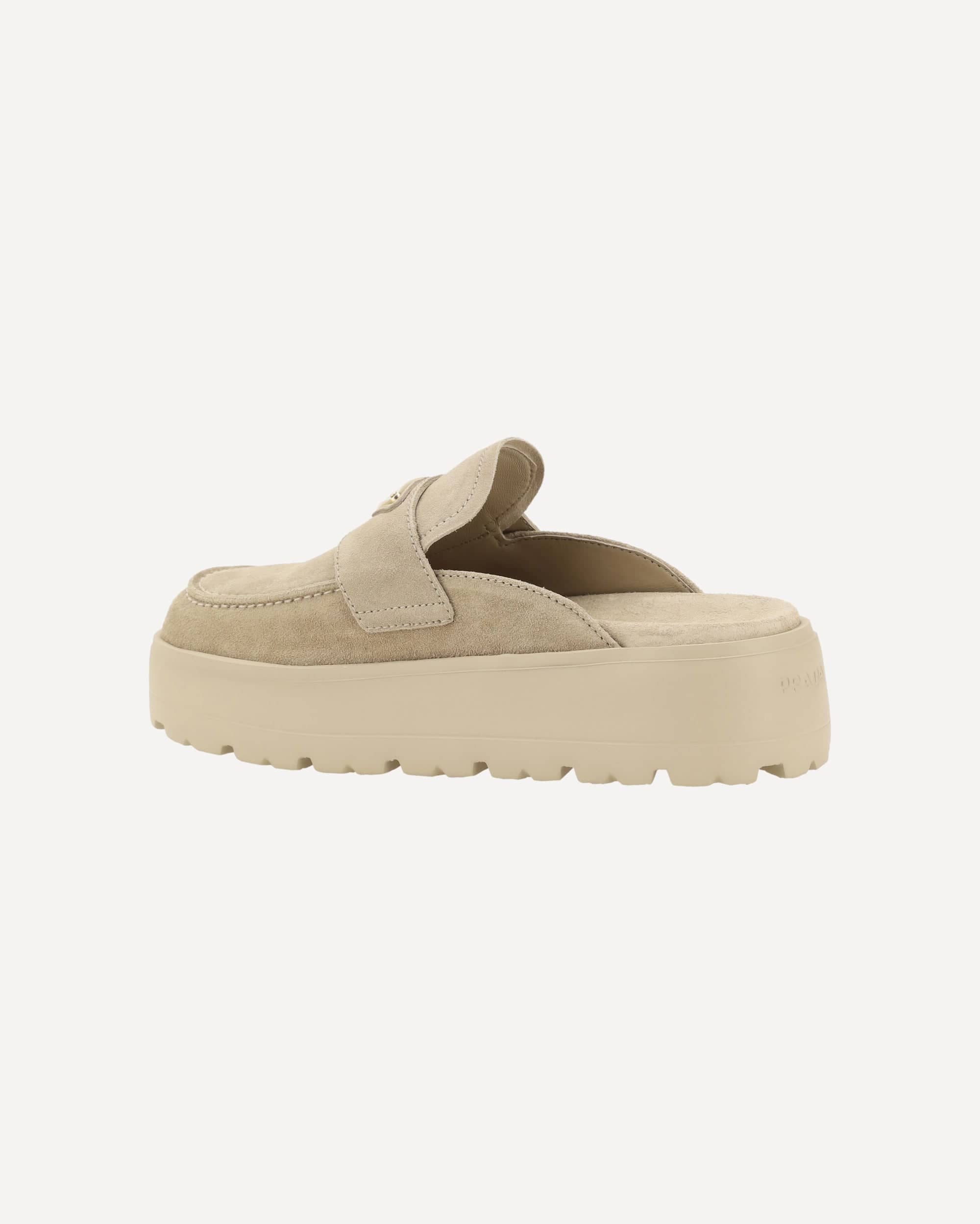 Prada Suede Mules With Triangular Plaque