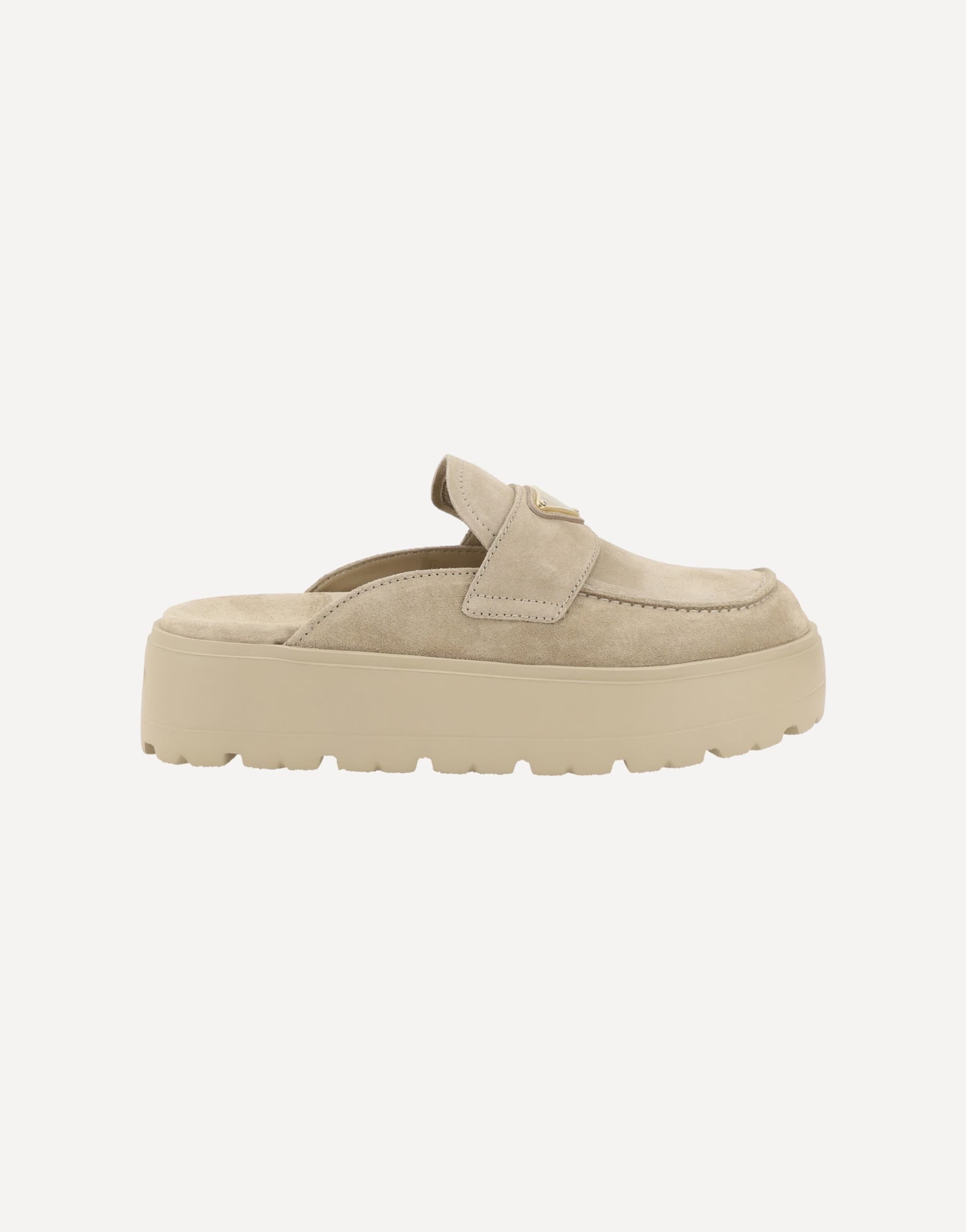 Prada Suede Mules With Triangular Plaque