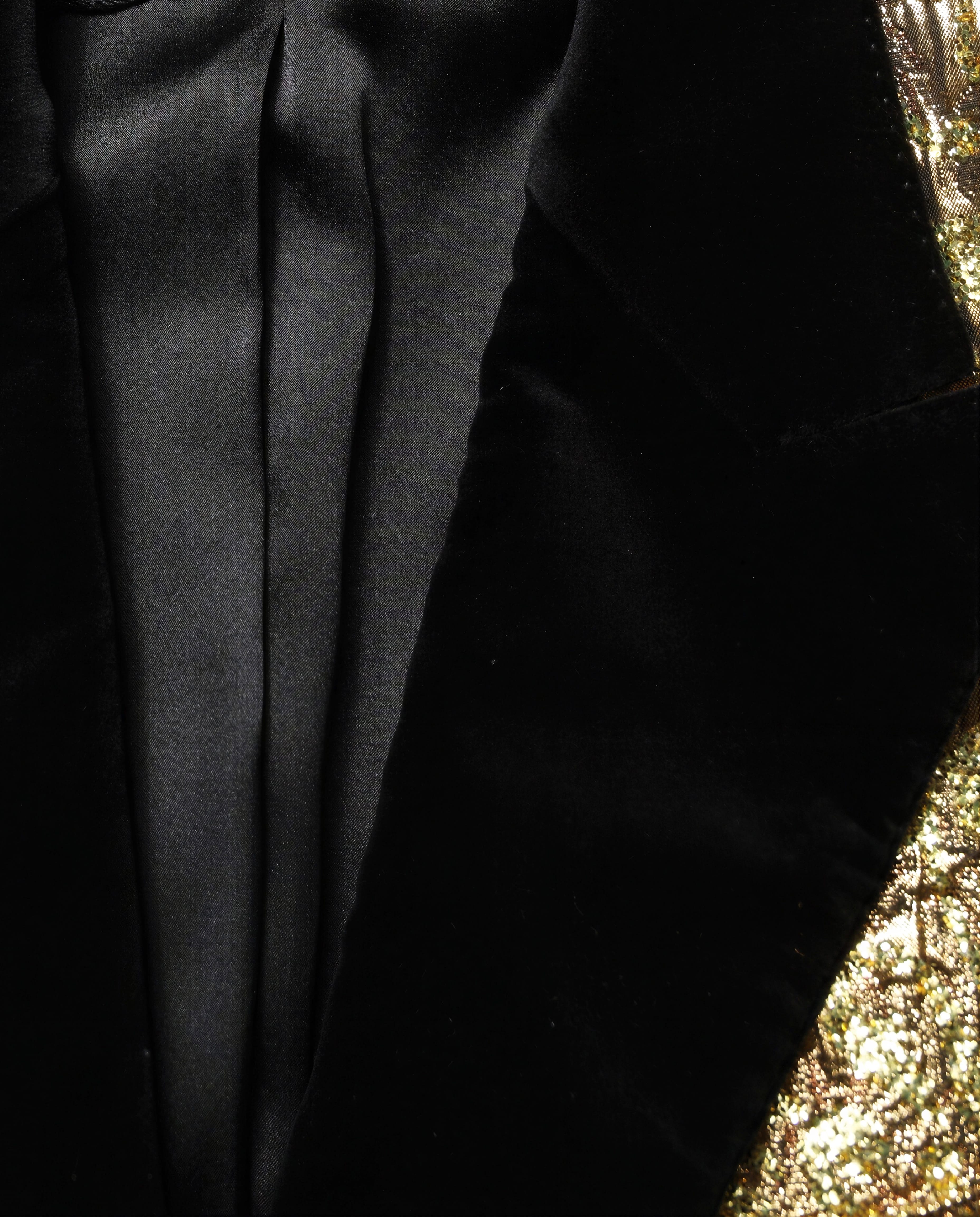 Dolce & Gabbana معطف طويل بجاكار معدني من Dolce & Gabbana