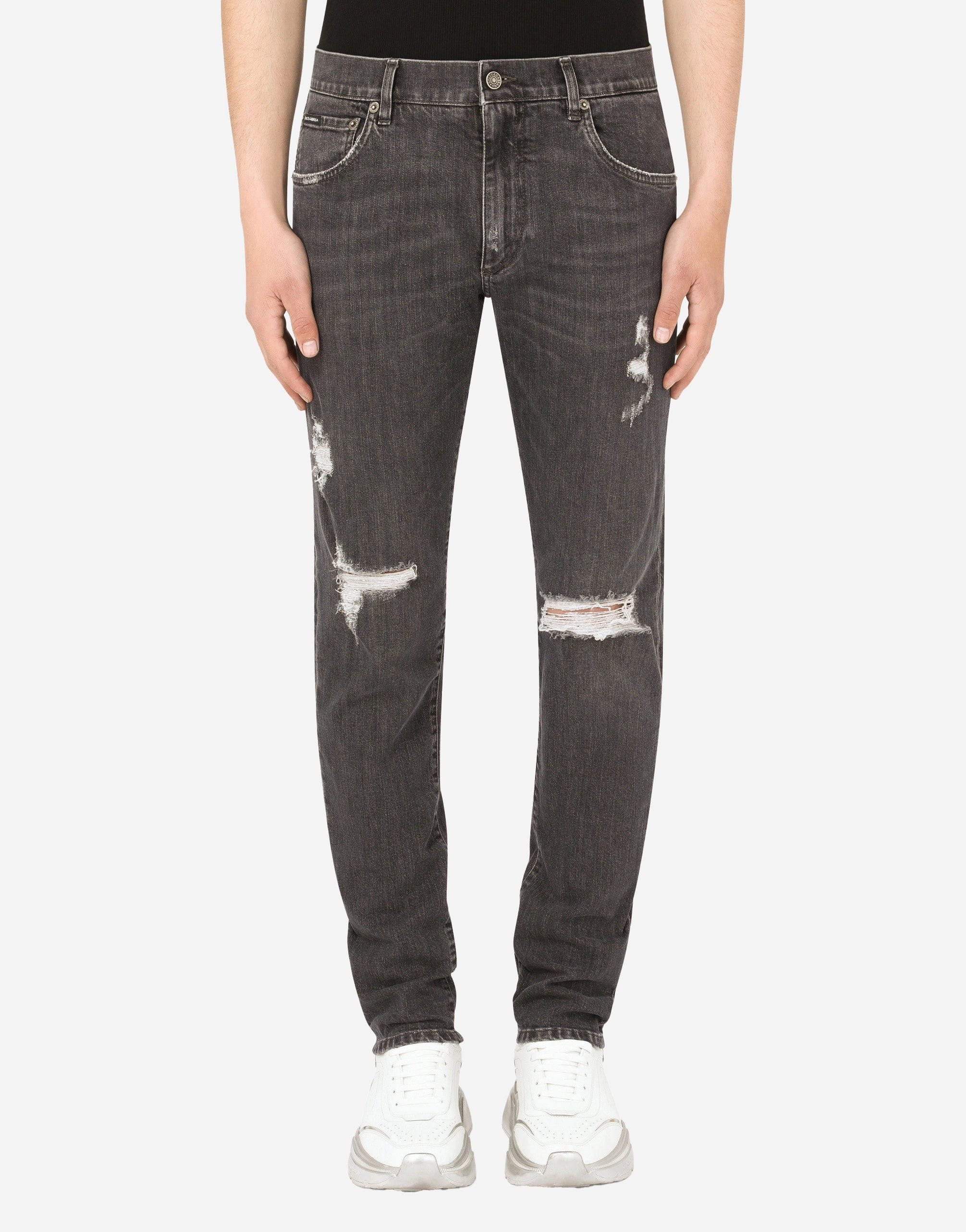 Jeans de algodón de ajuste delgado con rasgaduras