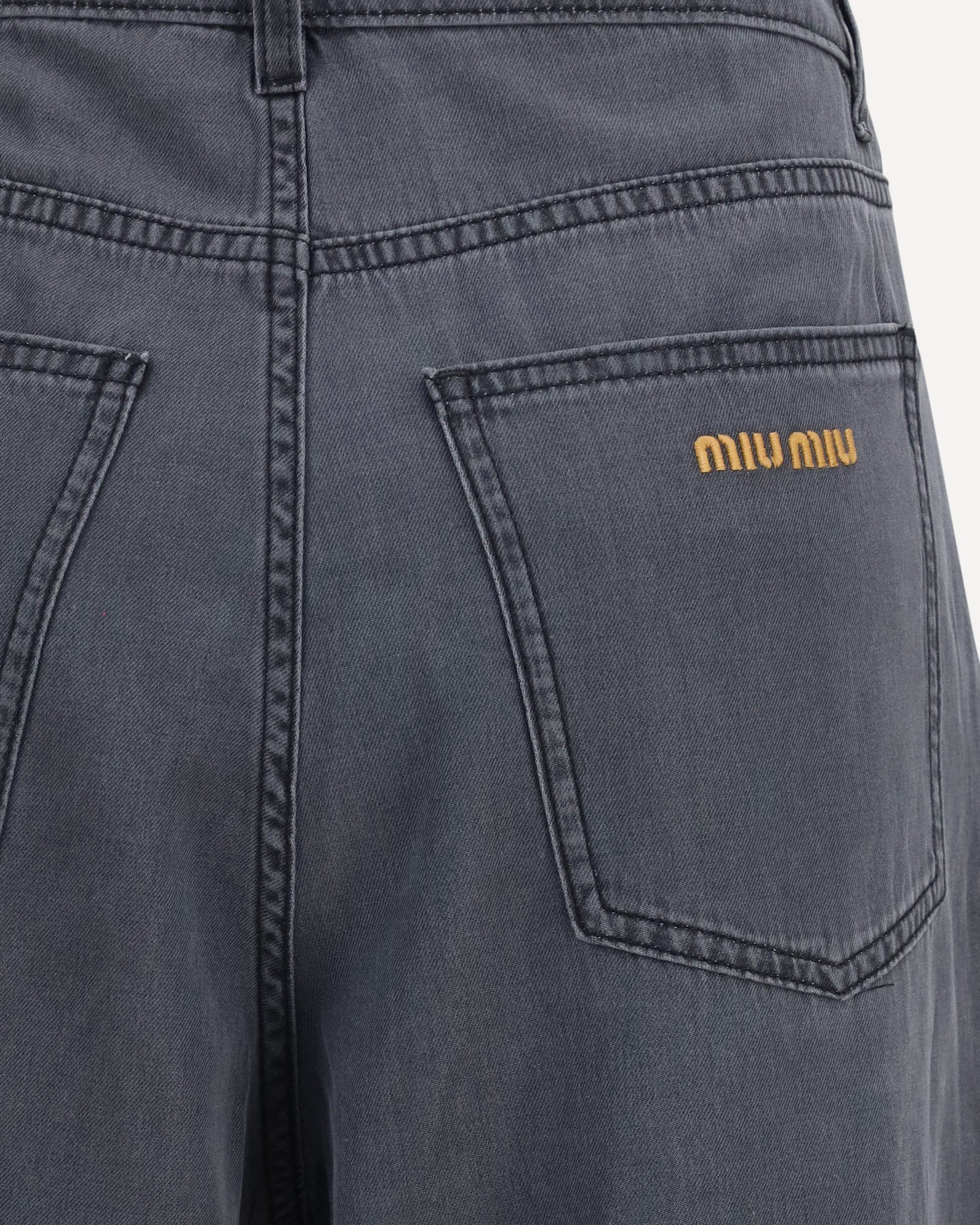 جينز قطني من Miu Miu